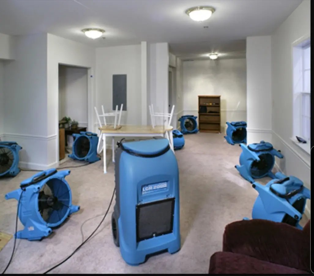 Air movers and dehumidifier setup for Water Damage Restoration in De Queen